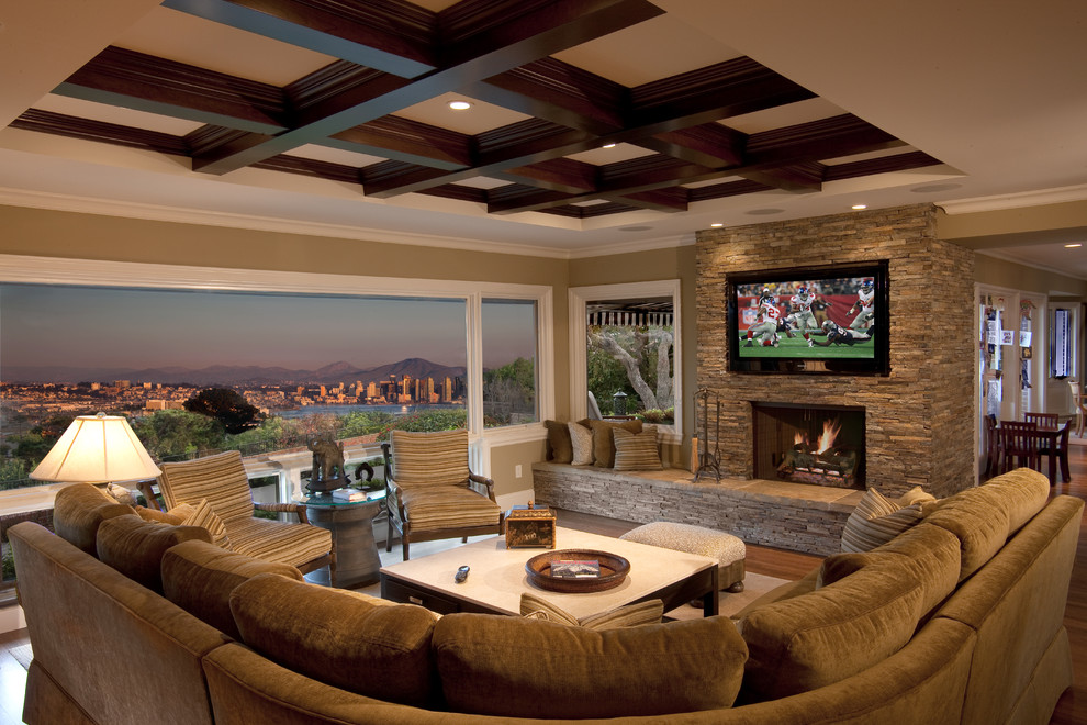 Trendy family room photo in San Diego with a stone fireplace