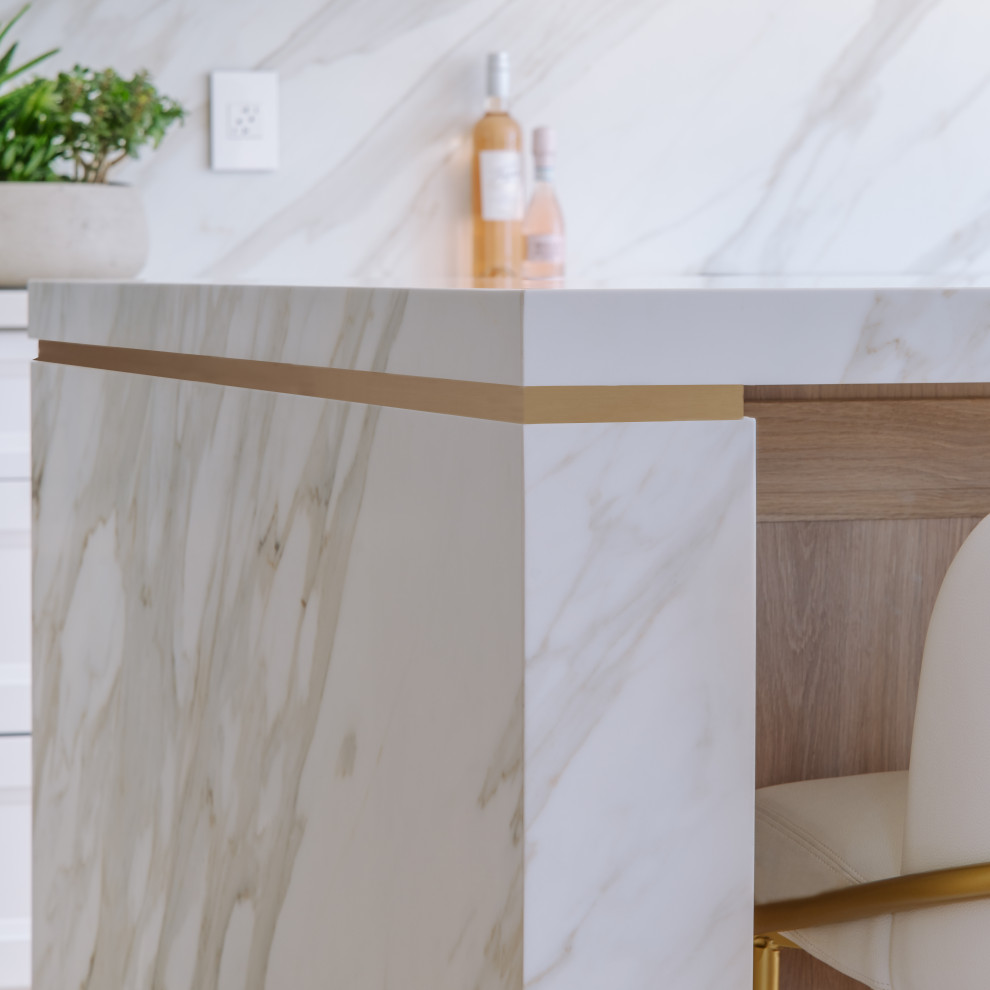 Mid-sized transitional galley light wood floor and beige floor open concept kitchen photo in Ottawa with an undermount sink, recessed-panel cabinets, white cabinets, quartz countertops, white backsplash, porcelain backsplash, stainless steel appliances, an island and white countertops