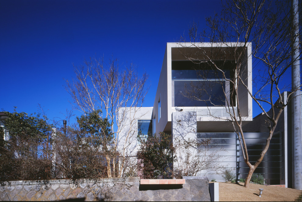 Photo of a modern home design in Tokyo.