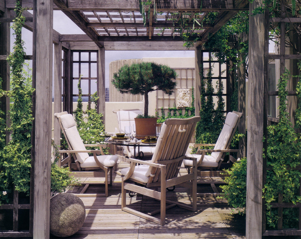 Inspiration for a country deck in Atlanta with a pergola.