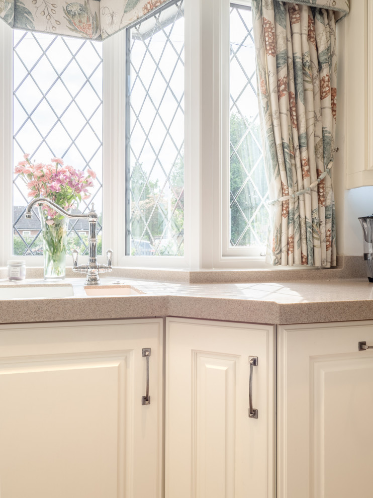 Small shabby-chic style kitchen in West Midlands.