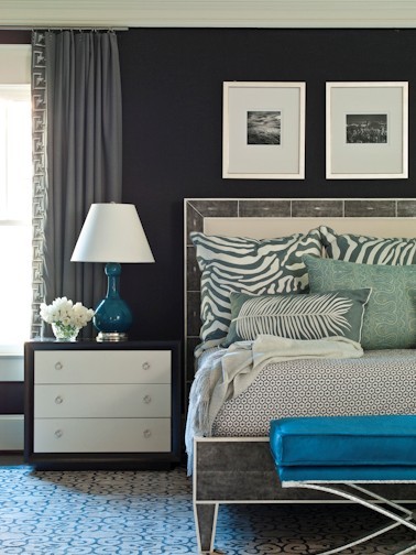 Bedroom - contemporary master bedroom idea in Atlanta with black walls