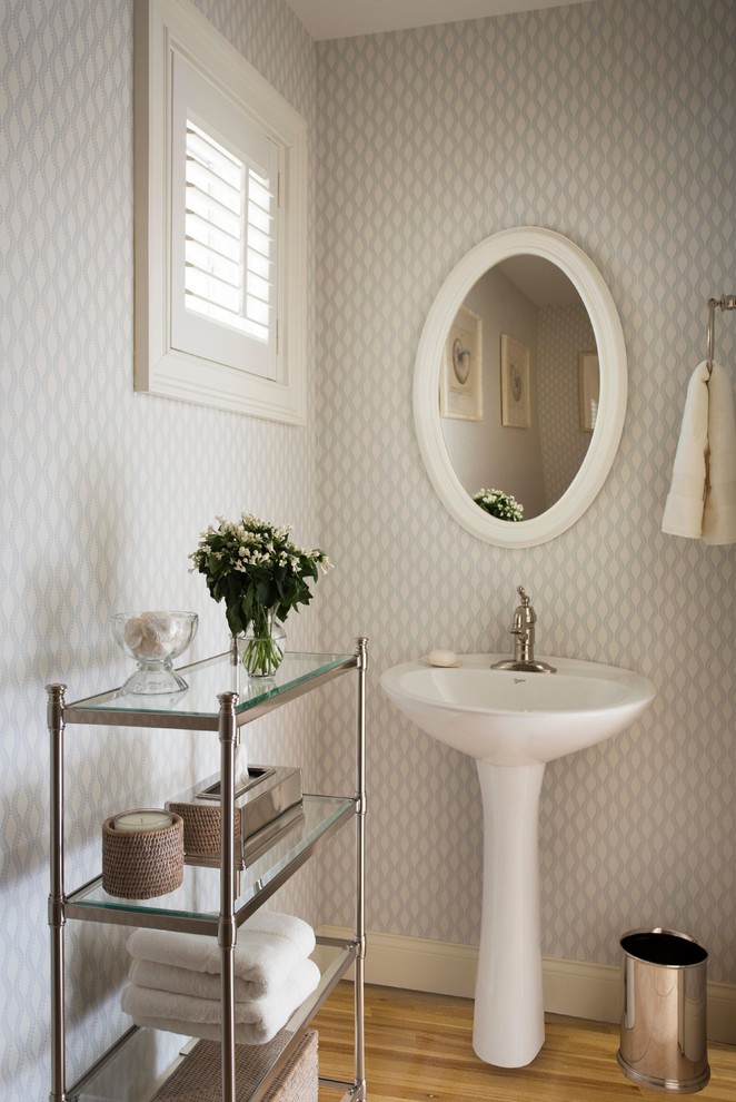 Beach style powder room in Boston with a pedestal sink and multi-coloured walls.