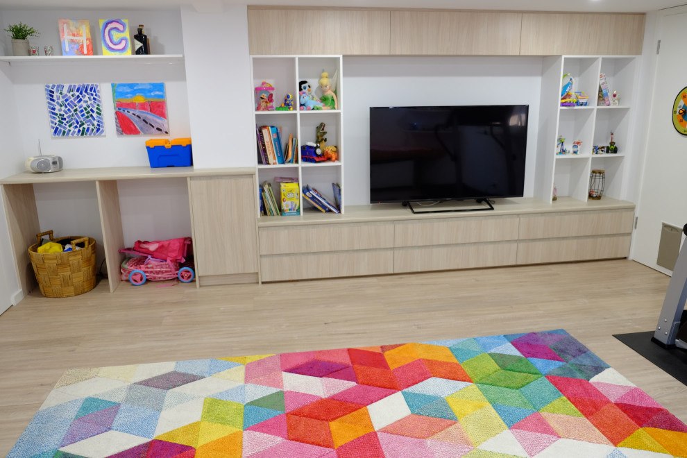 Design ideas for a large contemporary kids' playroom for kids 4-10 years old in Sydney with white walls and vinyl floors.