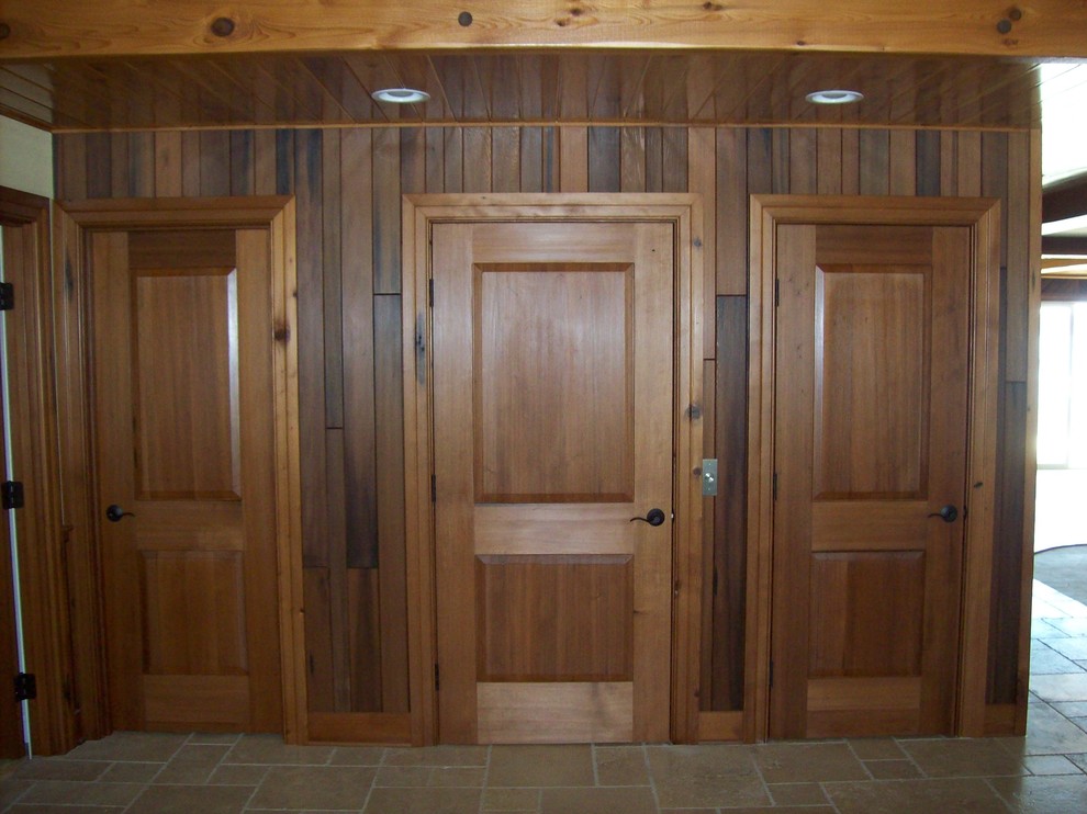 Example of a mountain style basement design in Raleigh