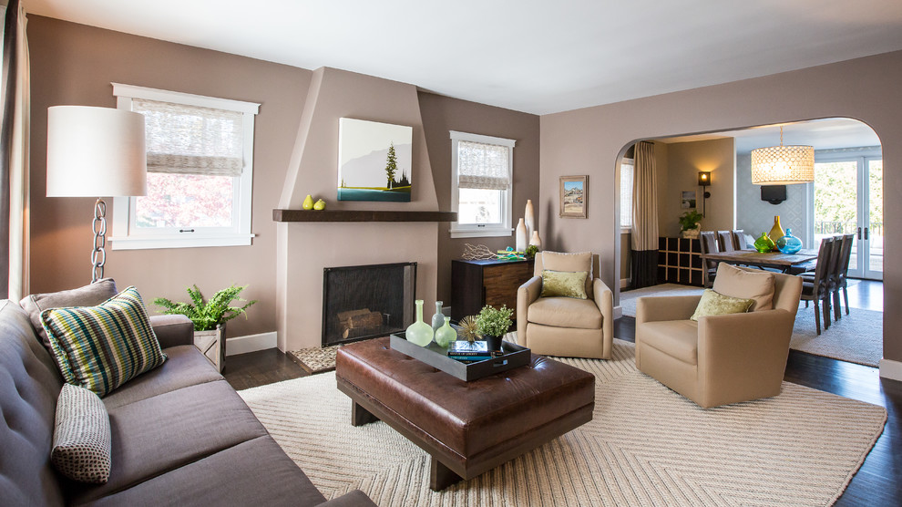 This is an example of a transitional living room in San Francisco with grey walls.