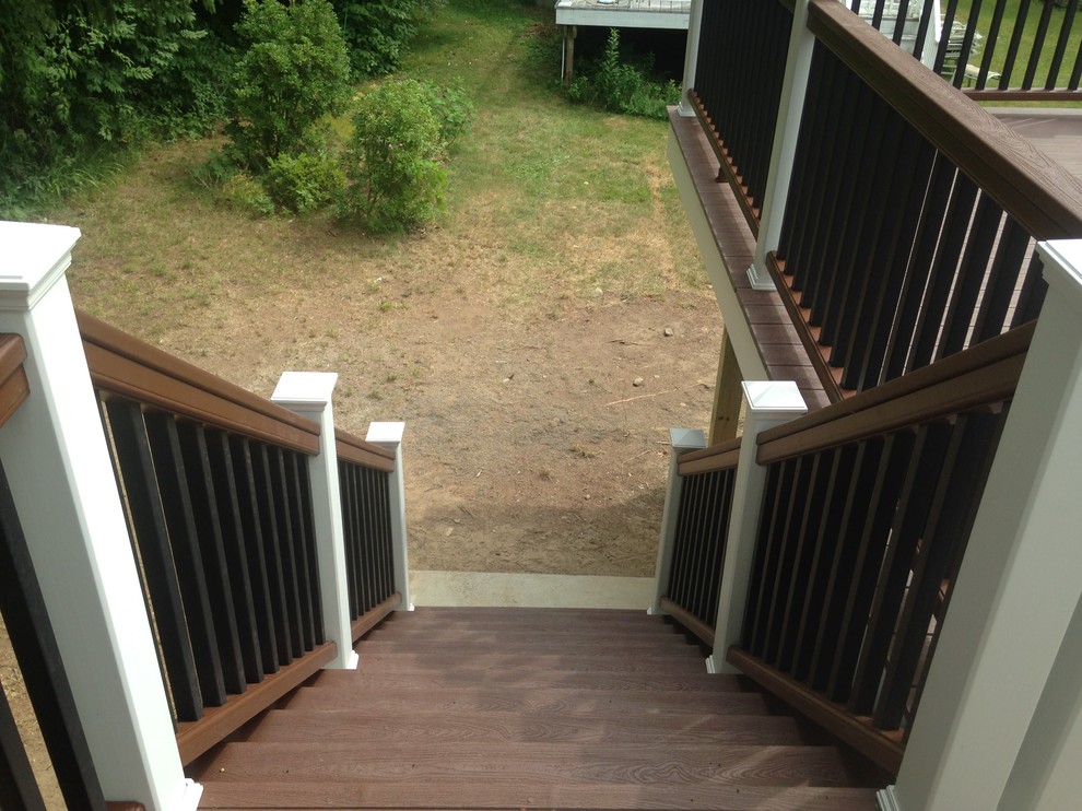 Deck - mid-sized traditional backyard deck idea