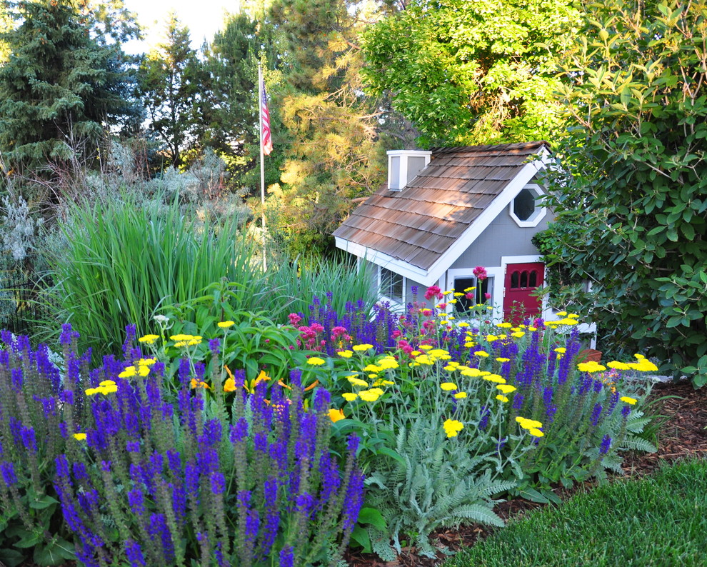 This is an example of a traditional backyard garden in Denver.