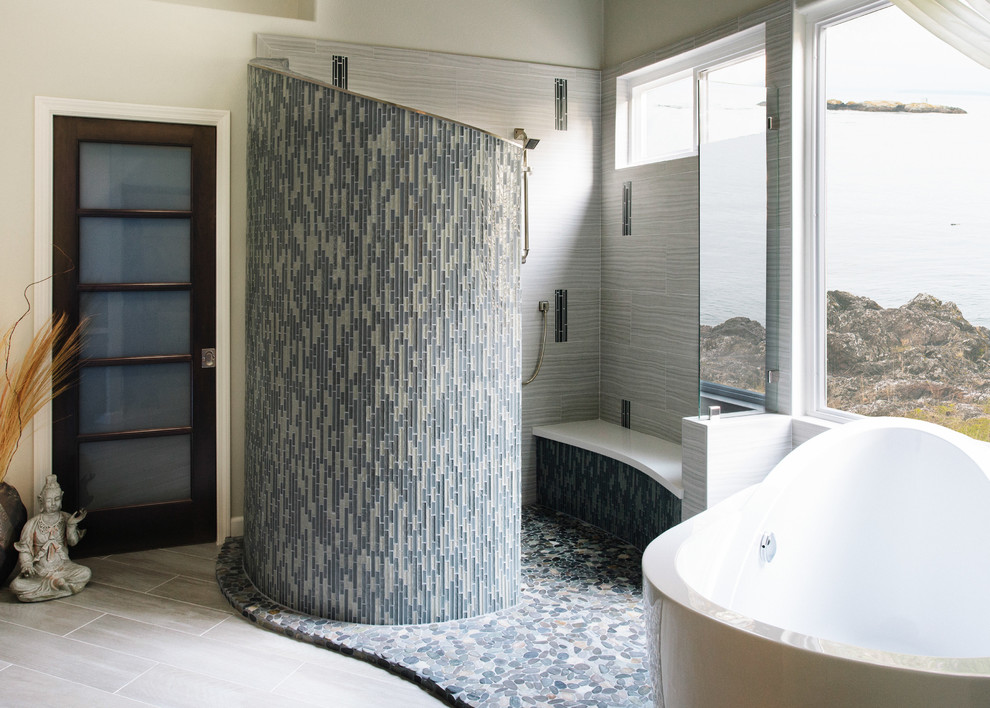 Inspiration for a large contemporary master bathroom in Orange County with a freestanding tub, glass tile, flat-panel cabinets, dark wood cabinets, a curbless shower, white walls, vinyl floors, a vessel sink and engineered quartz benchtops.