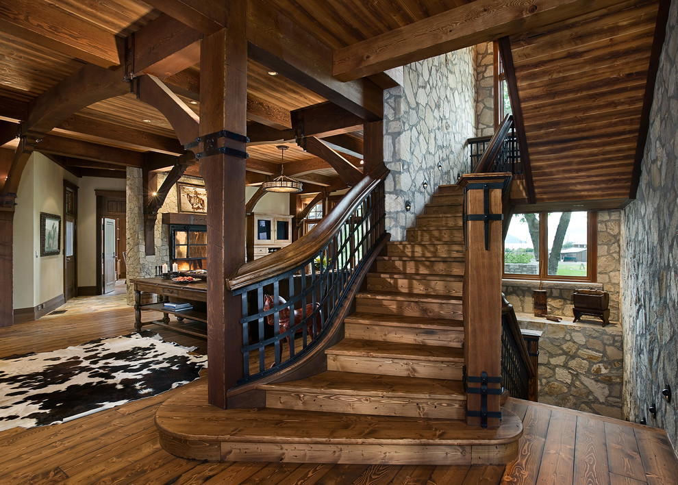Inspiration for a country wood u-shaped staircase in Other with wood risers and mixed railing.