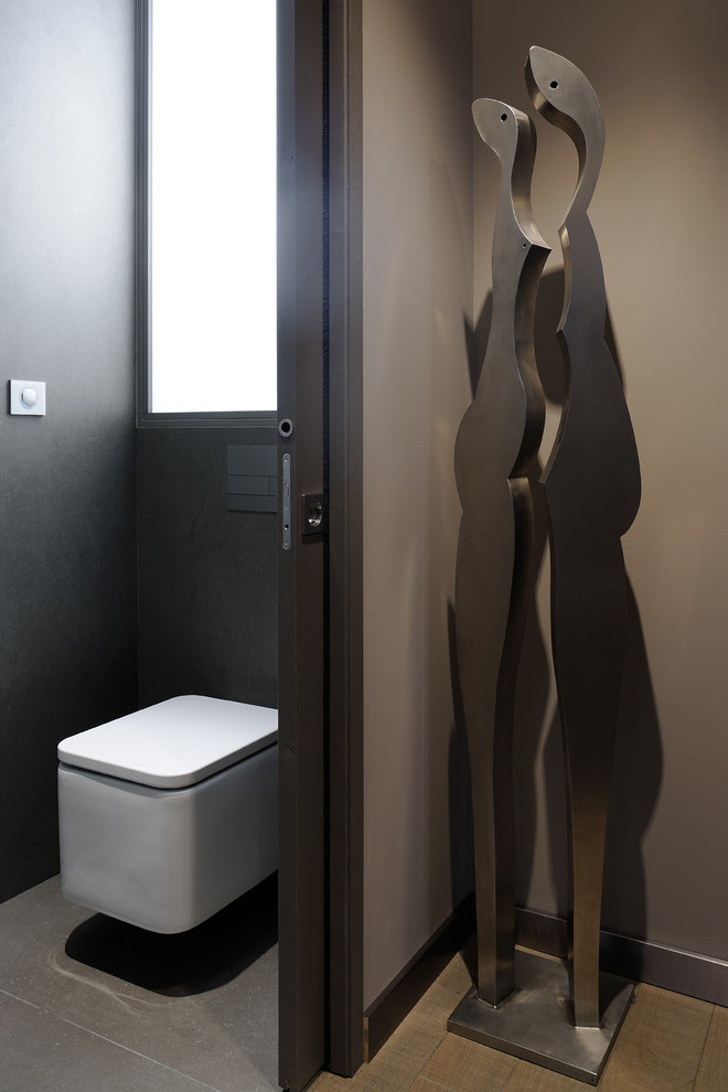 Design ideas for a contemporary powder room in Lyon.
