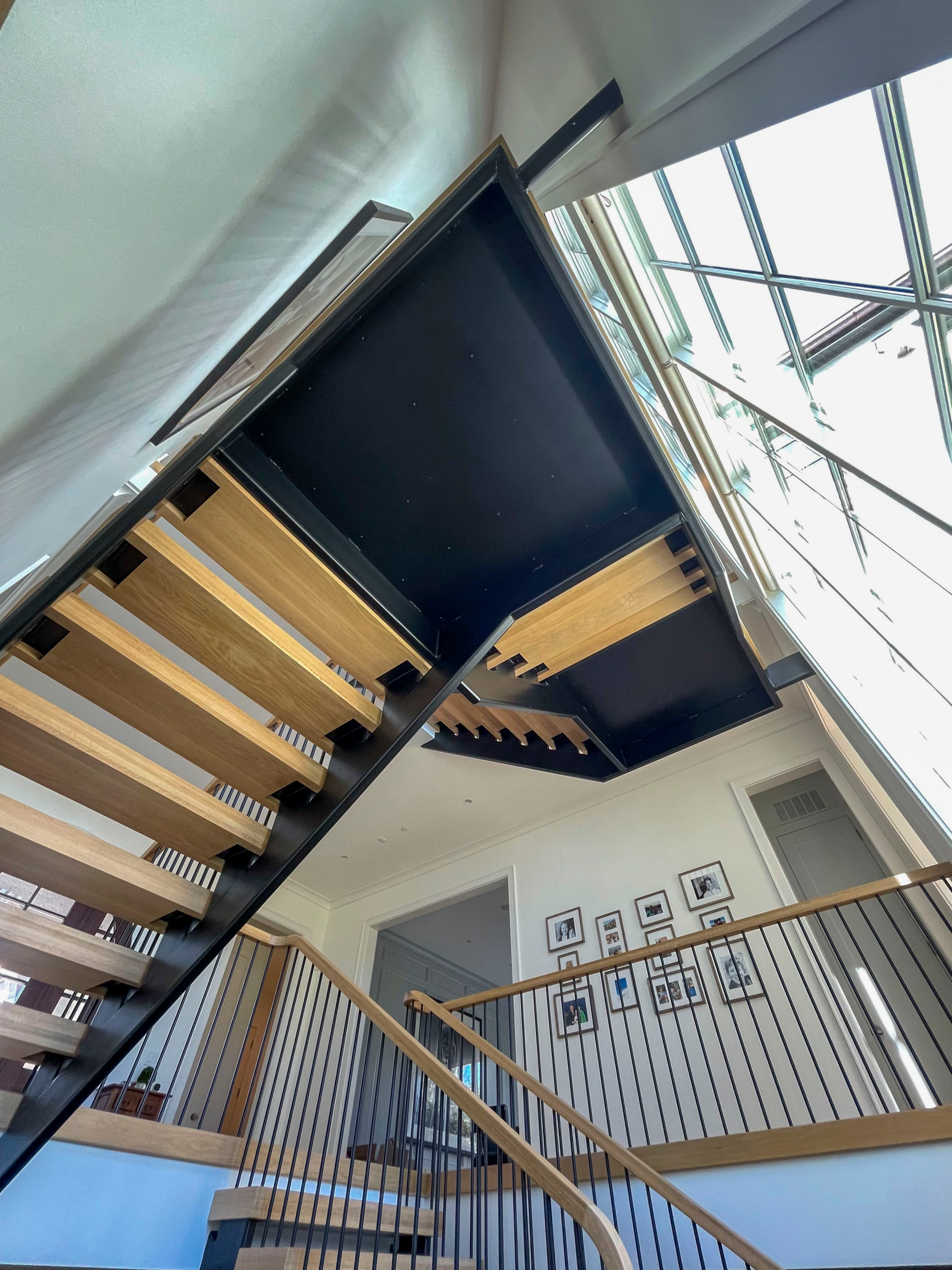96_Dramatic cantilevered no-riser staircase, Bethesda, MD 20814