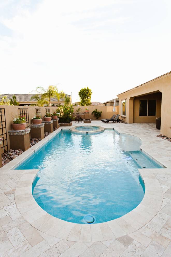 Inspiration for a mediterranean pool remodel in Phoenix