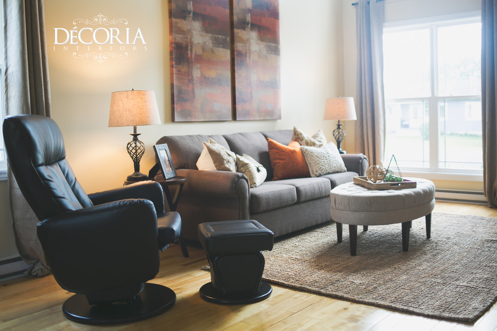 Home design - small transitional formal and open concept light wood floor and beige floor home design idea with beige walls, a standard fireplace and a tv stand
