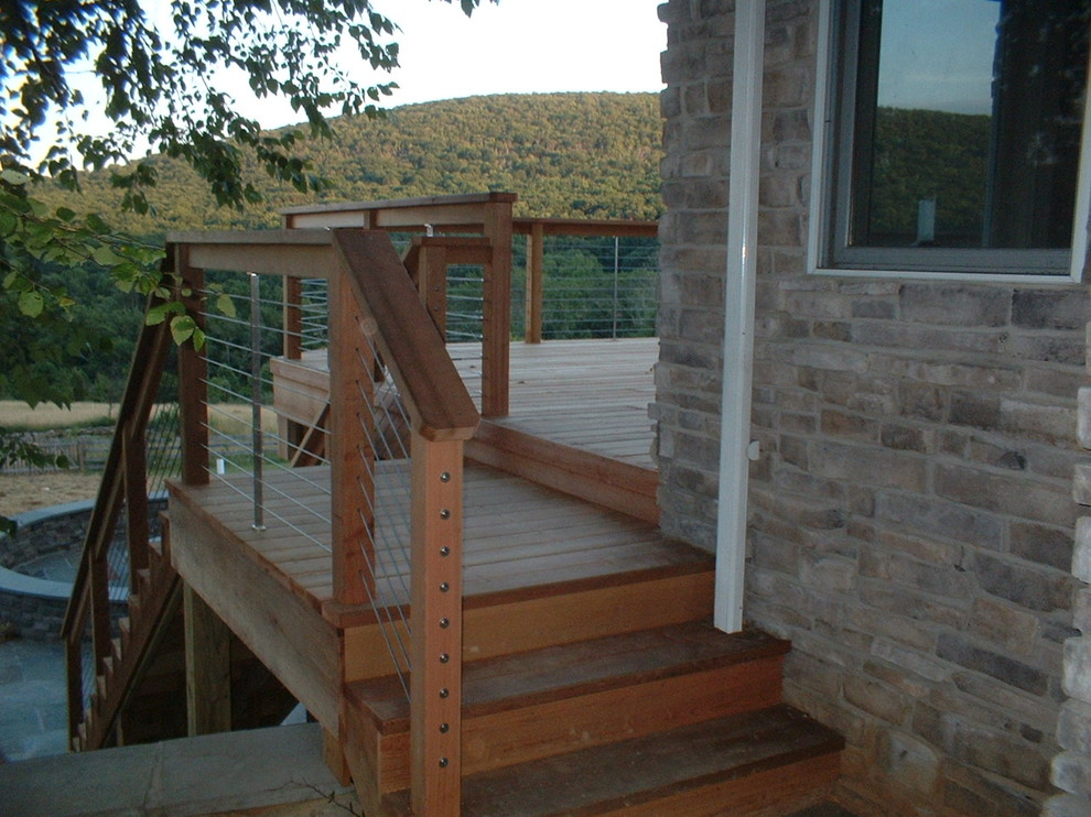 This is an example of a country backyard patio in DC Metro with decking.