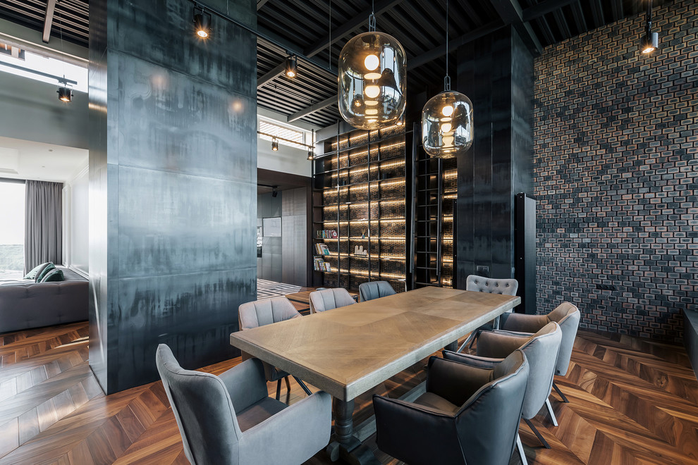 This is an example of a modern open plan dining in Miami with black walls, dark hardwood floors and brown floor.