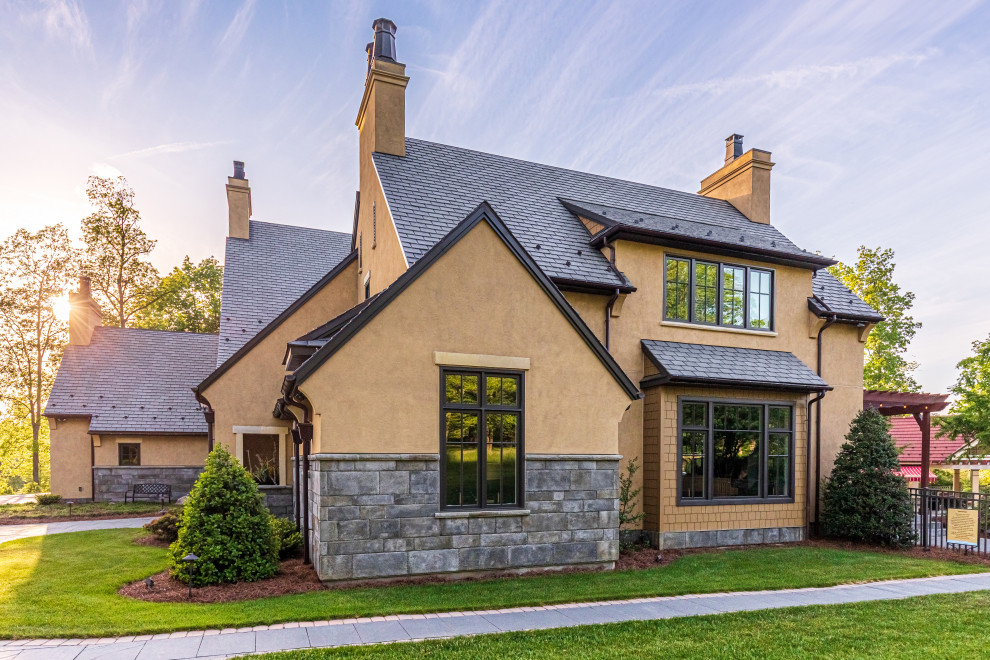 Inspiration for an expansive three-storey beige house exterior in Philadelphia with concrete fiberboard siding, a gable roof, a shingle roof, a grey roof and shingle siding.