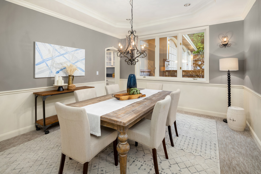 Design ideas for a large transitional separate dining room in Seattle with carpet, grey floor, grey walls, recessed and decorative wall panelling.