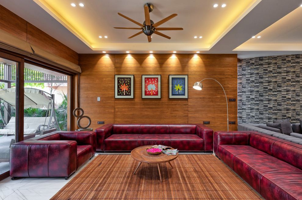 This is an example of a contemporary living room in Ahmedabad.