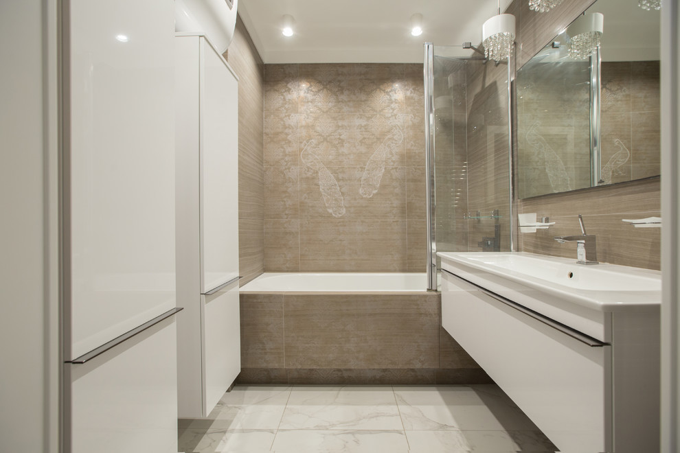 Photo of a contemporary master bathroom in Other with beige tile and an integrated sink.