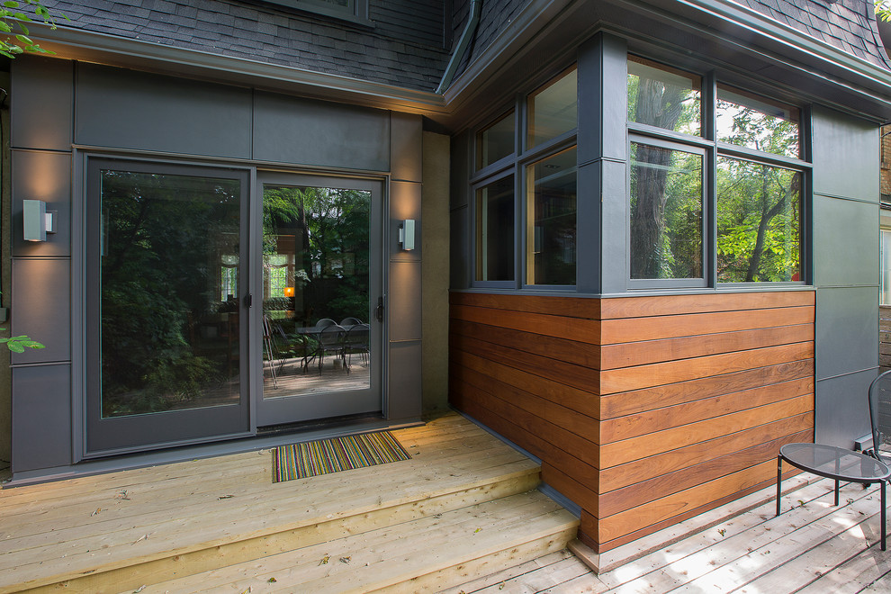 Photo of a mid-sized contemporary backyard deck in Toronto.