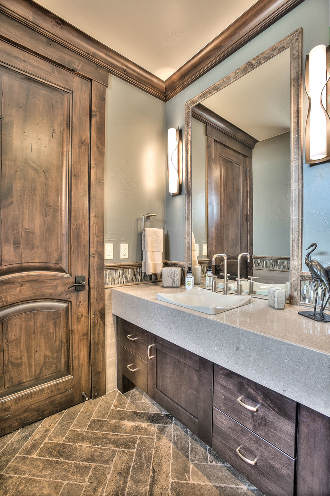 Mid-sized country 3/4 bathroom in Denver with shaker cabinets, dark wood cabinets, multi-coloured tile, matchstick tile, green walls, slate floors, a drop-in sink, engineered quartz benchtops, an alcove shower and a two-piece toilet.