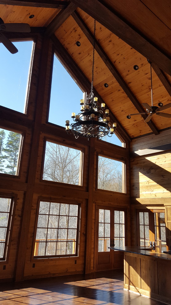 Inspiration for a mid-sized rustic u-shaped dark wood floor open concept kitchen remodel in Atlanta with shaker cabinets, medium tone wood cabinets, wood countertops and an island