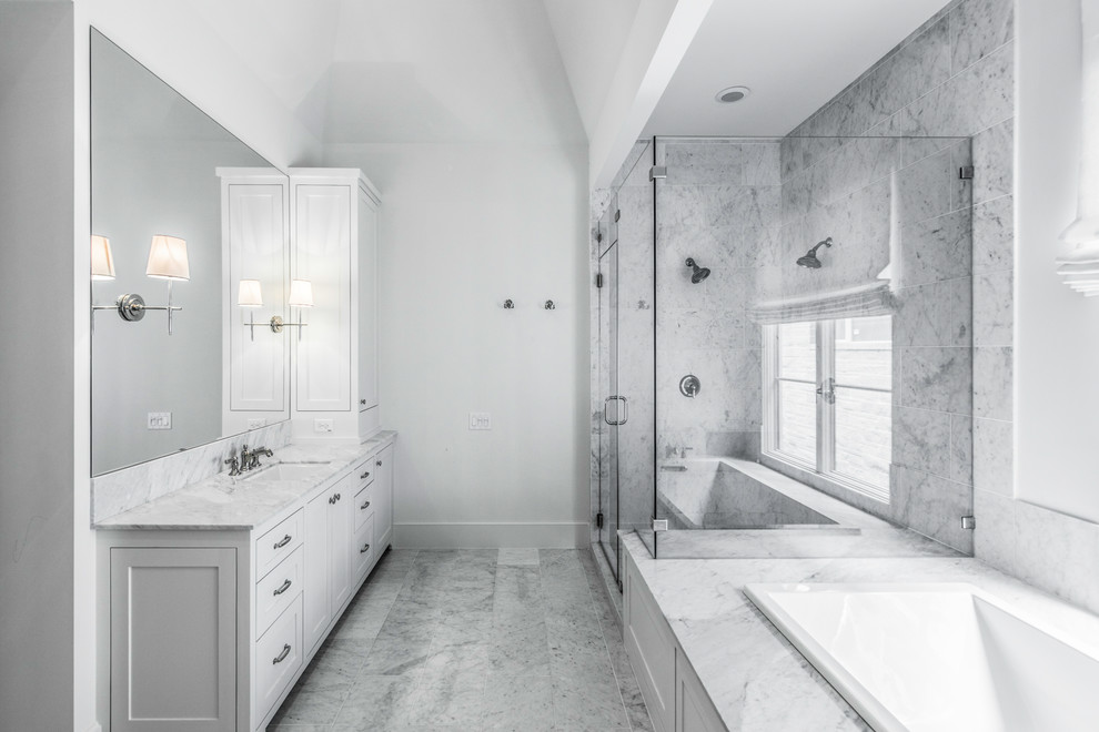 This is an example of a large mediterranean 3/4 bathroom in Houston with open cabinets, dark wood cabinets, a corner tub, an open shower, a one-piece toilet, white tile, ceramic tile, grey walls, light hardwood floors, a drop-in sink, concrete benchtops, beige floor and an open shower.