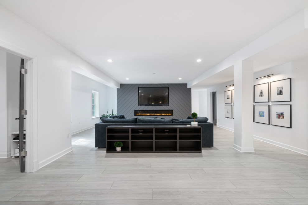 Medium sized modern open plan living room in Richmond with white walls, vinyl flooring, all types of fireplace, a timber clad chimney breast, a built-in media unit, grey floors, all types of ceiling and all types of wall treatment.