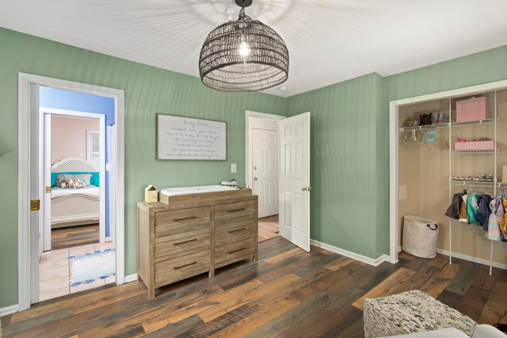 Transitional girl dark wood floor and brown floor nursery photo