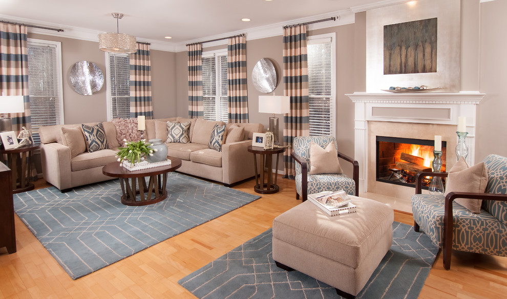 Design ideas for a mid-sized transitional enclosed family room in Atlanta with light hardwood floors, a standard fireplace and a tile fireplace surround.