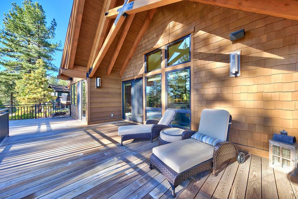 Large transitional backyard deck photo with no cover