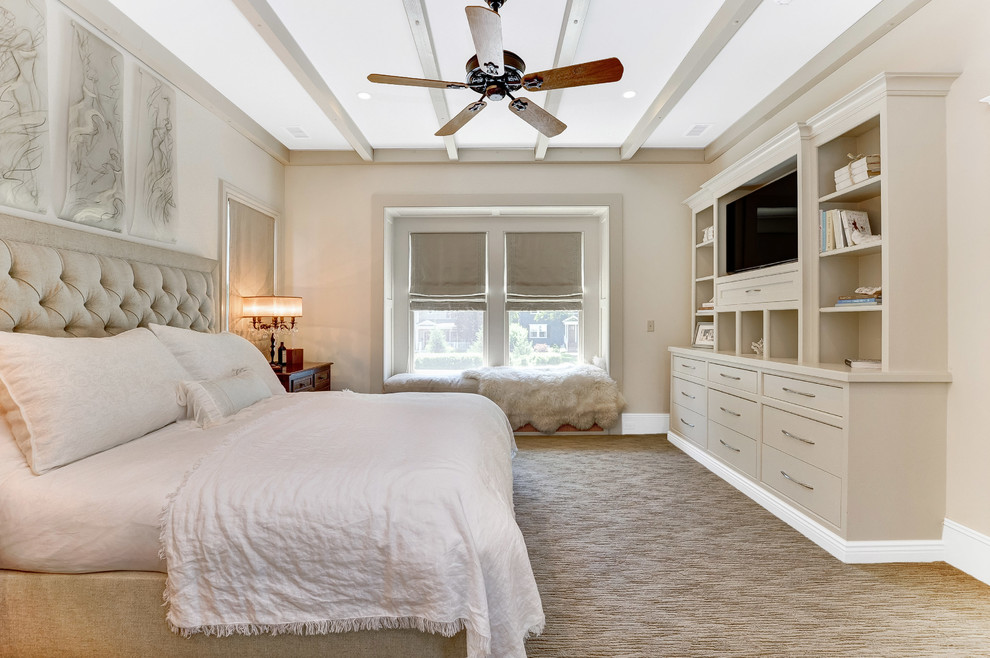 This is an example of a traditional bedroom in New York with beige walls, carpet and beige floor.