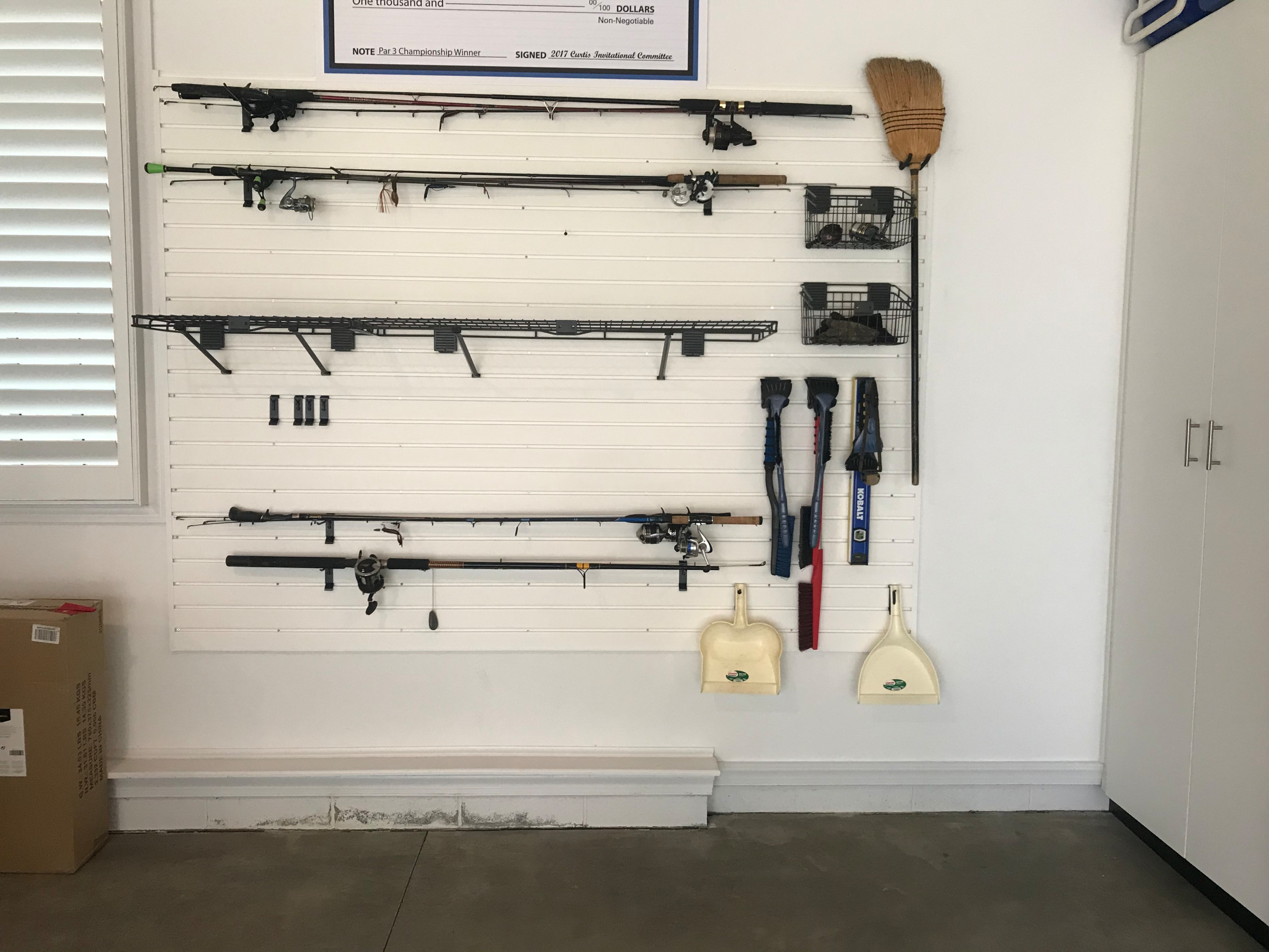 Garage with Cabinets & Slat Wall