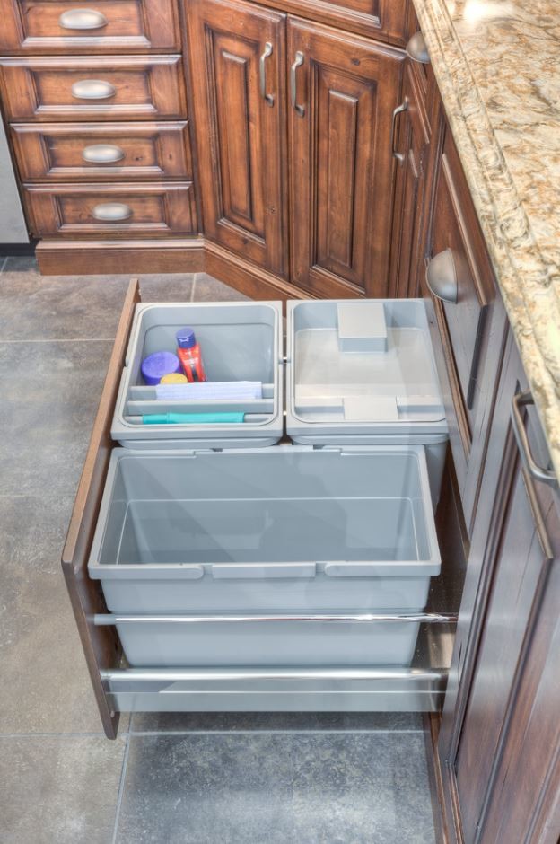 Inspiration for a large rustic u-shaped porcelain tile eat-in kitchen remodel in Toronto with an undermount sink, raised-panel cabinets, brown cabinets, quartz countertops, beige backsplash, stainless steel appliances and an island