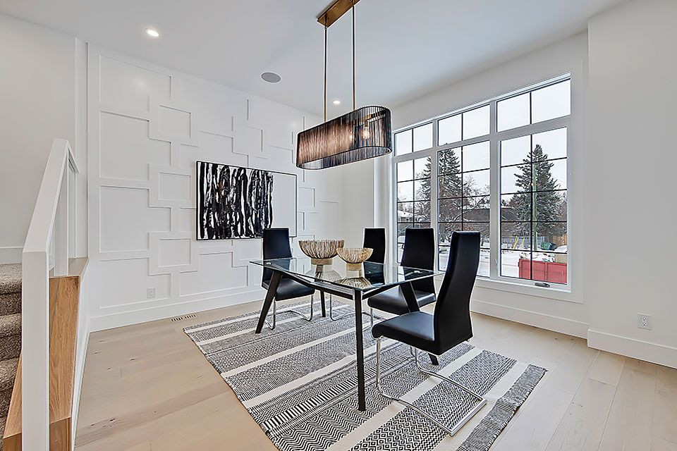 Transitional home design photo in Calgary