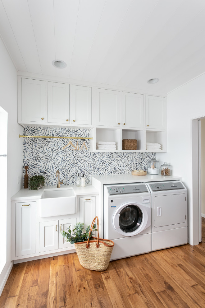 Inspiration for a transitional laundry room remodel in Cleveland