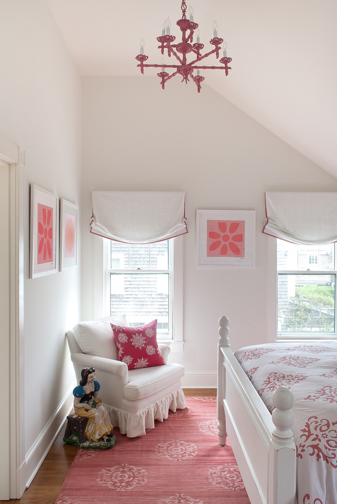Photo of a beach style kids' room in Boston with white walls.