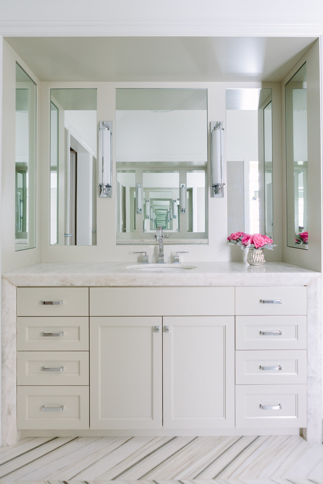 Large transitional master bathroom in Chicago with beaded inset cabinets, a freestanding tub, brown tile, porcelain floors, an undermount sink, tile benchtops, multi-coloured floor, multi-coloured benchtops, white cabinets and beige walls.