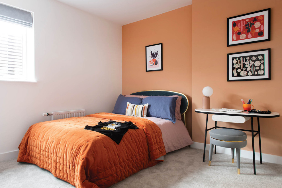 Contemporary bedroom in London with orange walls, carpet, no fireplace and grey floor.