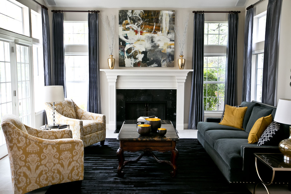 Example of a transitional formal and enclosed living room design in Austin