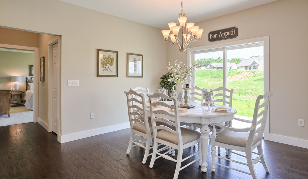 Inspiration for a large traditional open plan dining in Other with grey walls and medium hardwood floors.