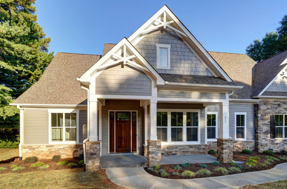 Example of a transitional home design design in Charlotte