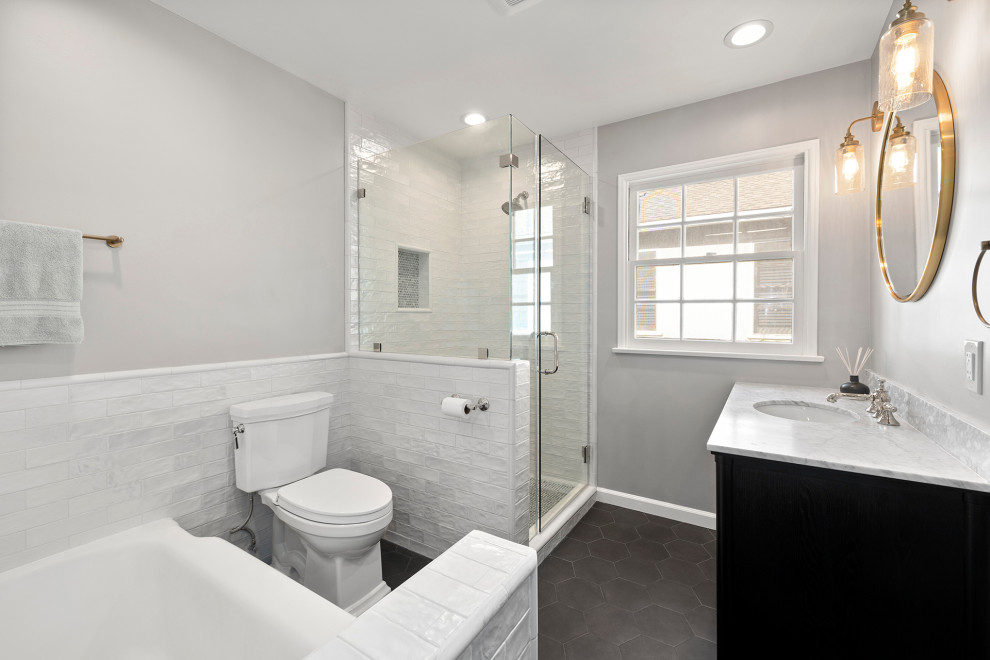 Réalisation d'une salle de bain principale design en bois foncé de taille moyenne avec un placard en trompe-l'oeil, une baignoire en alcôve, une douche d'angle, WC séparés, un carrelage blanc, des carreaux de béton, un mur gris, carreaux de ciment au sol, un lavabo posé, un plan de toilette en quartz modifié, un sol gris, une cabine de douche à porte battante, un plan de toilette blanc, une niche, meuble simple vasque et meuble-lavabo encastré.