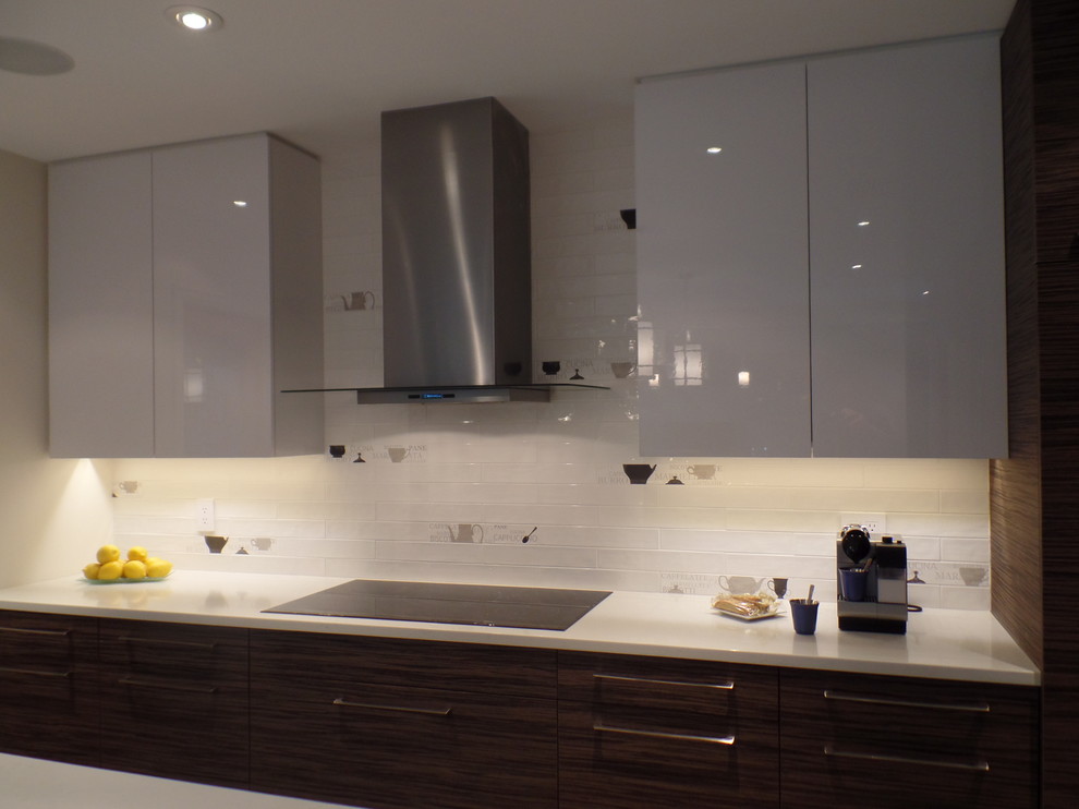 Inspiration for a mid-sized transitional l-shaped porcelain tile and beige floor enclosed kitchen remodel with an undermount sink, flat-panel cabinets, medium tone wood cabinets, quartz countertops, white backsplash, subway tile backsplash, paneled appliances and an island