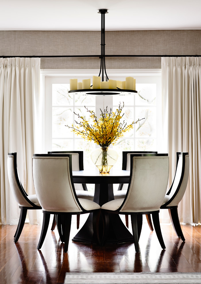 This is an example of a large transitional dining room in Melbourne with dark hardwood floors.