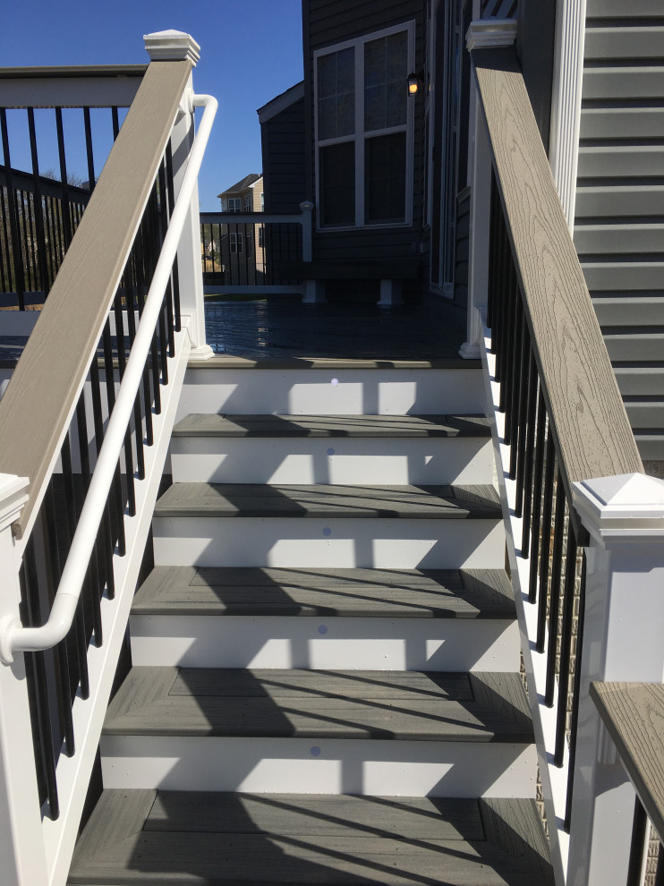 Mid-sized backyard second story staircase photo in Baltimore with no cover