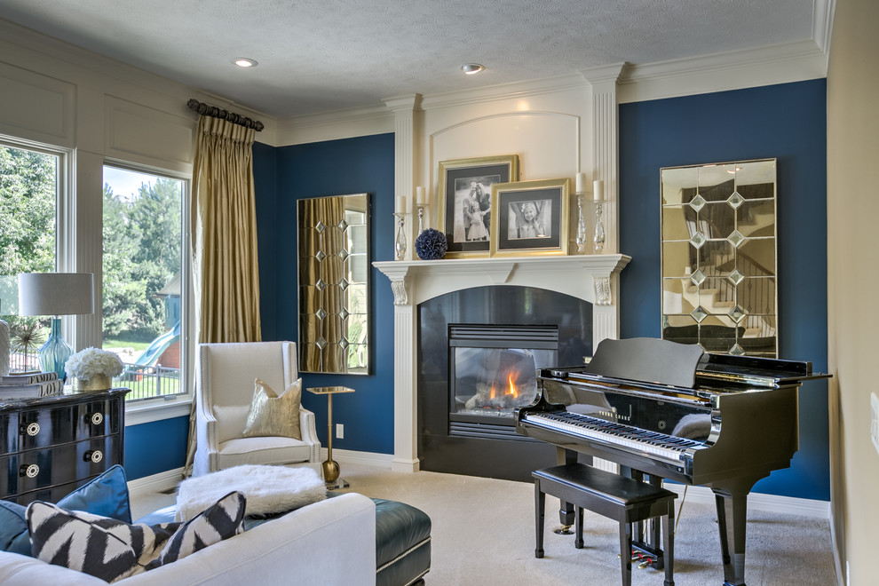 Inspiration for a mid-sized transitional enclosed carpeted and beige floor living room remodel in Omaha with a music area, blue walls, a ribbon fireplace and no tv