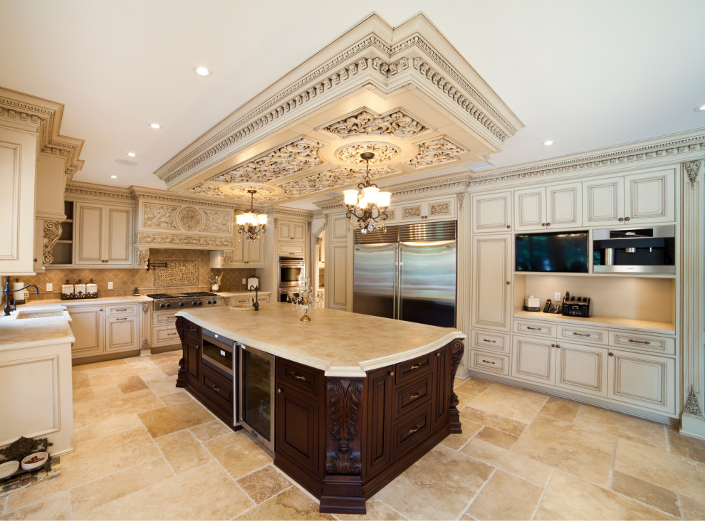 Design ideas for a large classic u-shaped enclosed kitchen in New York with a built-in sink, shaker cabinets, beige cabinets, engineered stone countertops, brown splashback, engineered quartz splashback, stainless steel appliances, an island, beige floors, beige worktops and a coffered ceiling.