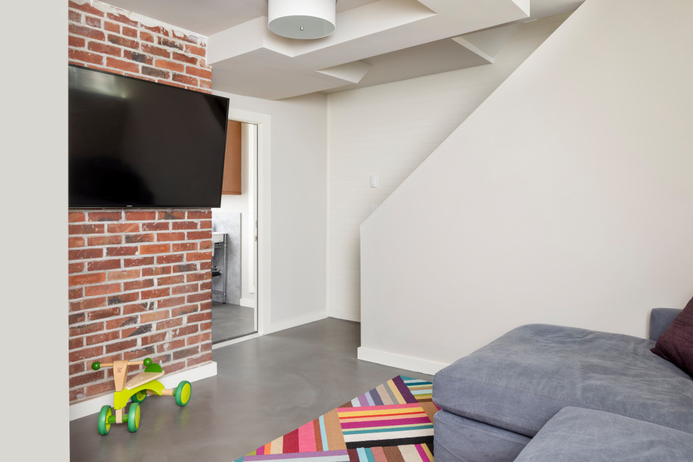 Basement - mid-sized transitional look-out concrete floor basement idea in Seattle with beige walls